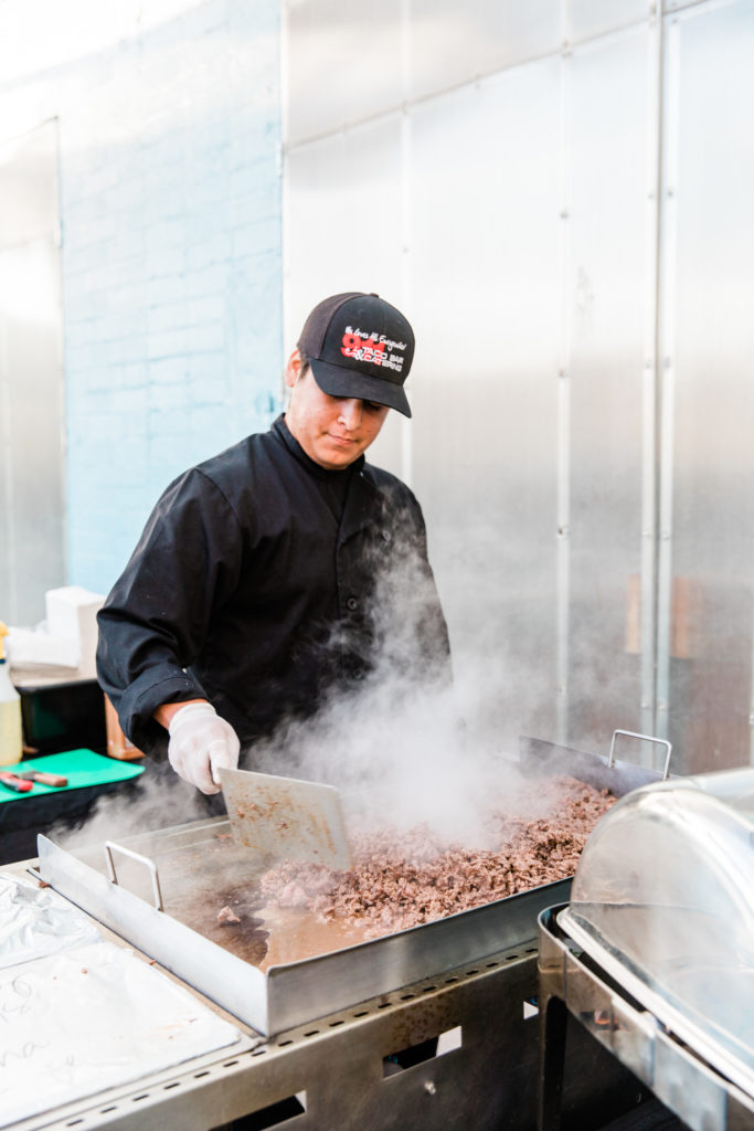 911 Taco Bar cooking up some meat for tacos at a wedding at The Doyle